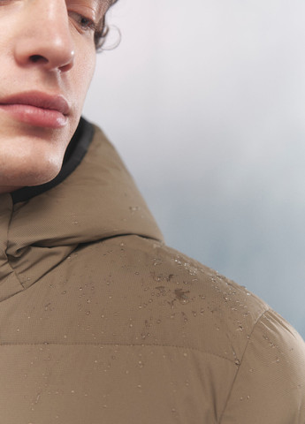 Бежева зимня куртка Springfield