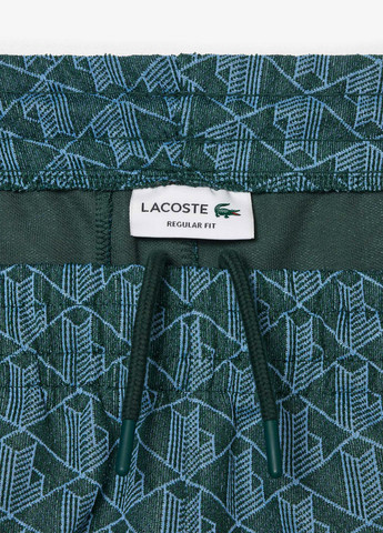 Зеленые спортивные демисезонные прямые брюки Lacoste