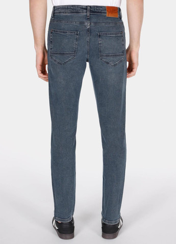 Темно-голубые демисезонные зауженные джинсы Colin's