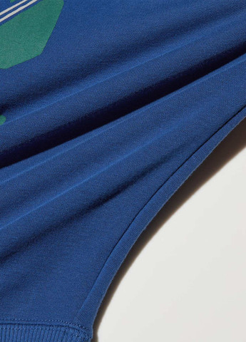 Синий свитшот Uniqlo надпись без декора (325746322)