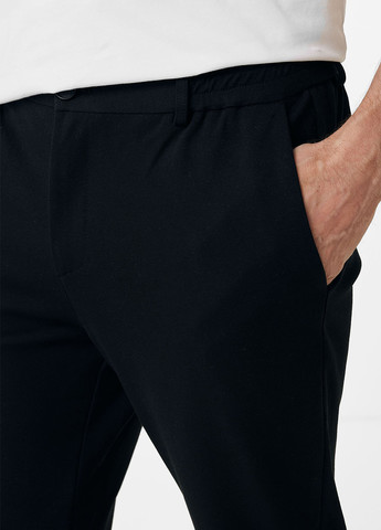 Черные кэжуал демисезонные зауженные брюки Mexx