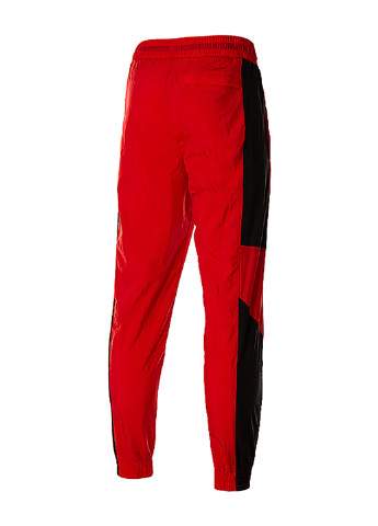 Красные спортивные демисезонные зауженные брюки Nike