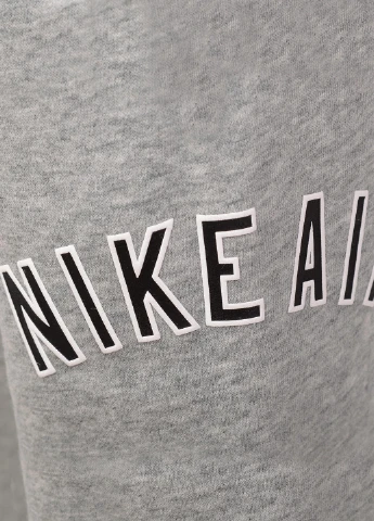 Серые спортивные демисезонные брюки джоггеры Nike