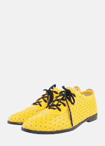 Желтые женские туфли - фото