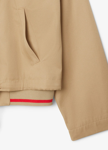 Бежевая демисезонная куртка Lacoste