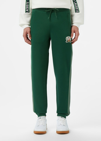 Зеленые спортивные демисезонные джоггеры брюки Lacoste