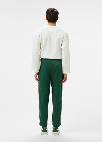 Зеленые спортивные демисезонные джоггеры брюки Lacoste