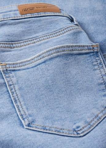 Голубые демисезонные зауженные джинсы C&A