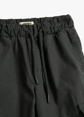 Черные кэжуал демисезонные брюки карго KOTON