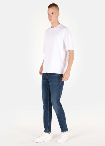 Темно-синие демисезонные зауженные джинсы Colin's