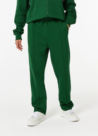 Зеленые спортивные демисезонные прямые брюки Lacoste