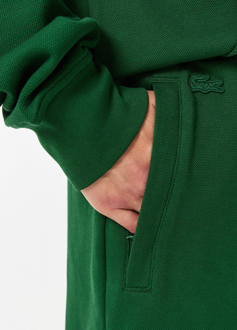 Зеленые спортивные демисезонные прямые брюки Lacoste