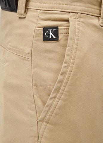 Бежевые кэжуал демисезонные зауженные брюки Calvin Klein Jeans