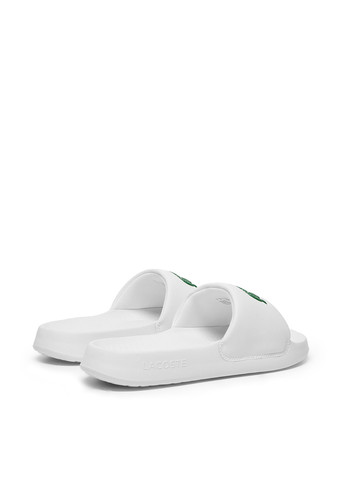 Белые спортивные шлепанцы Lacoste
