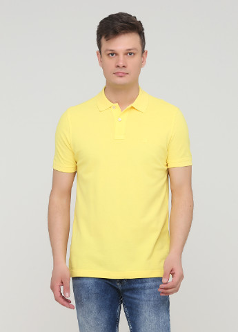 Желтая футболка-поло для мужчин United Colors of Benetton однотонная