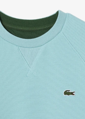 Голубой свитшот Lacoste однотонный без декора (298073922)