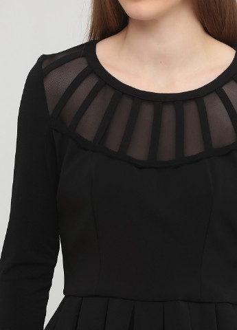 Чорна демісезонна блуза з баскою Nissa