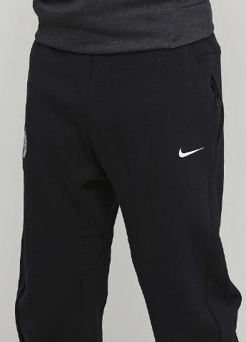 Темно-синие спортивные демисезонные прямые брюки Nike