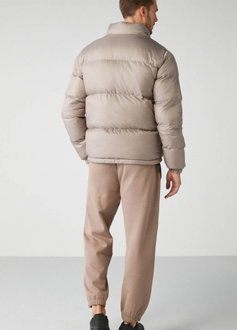 Бежева зимня куртка Grimelange