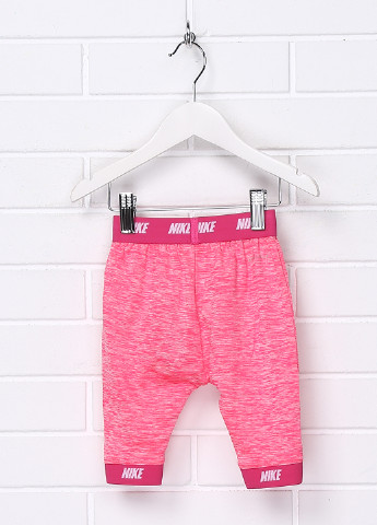 Розовые демисезонные леггинсы Nike
