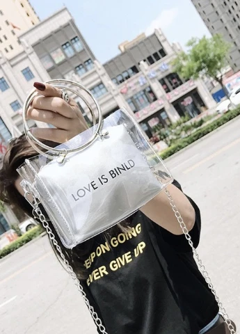 Жіноча класична прозора сумочка на ланцюжку з круглими ручками LOVE IS BINLD сіра NoName (251204192)