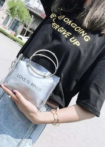 Жіноча класична прозора сумочка на ланцюжку з круглими ручками LOVE IS BINLD сіра NoName (251204192)