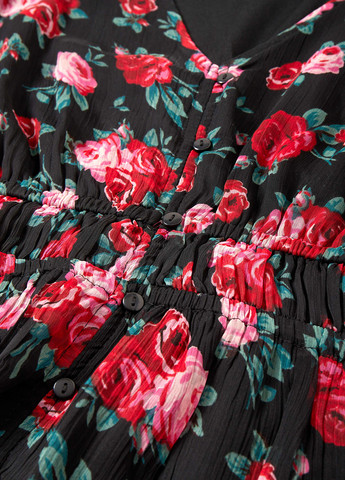 Чорна блуза з баскою C&A