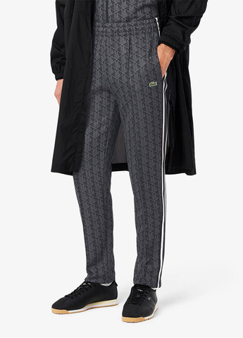 Темно-серые спортивные демисезонные зауженные брюки Lacoste