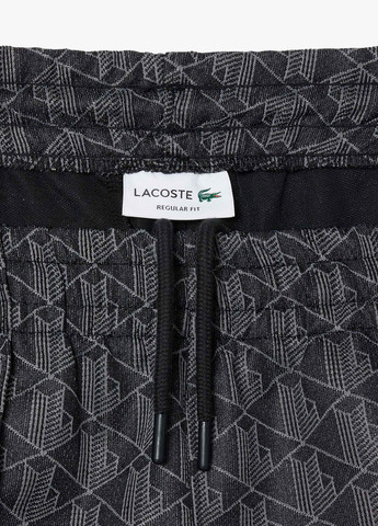 Темно-серые спортивные демисезонные зауженные брюки Lacoste