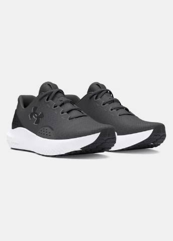 Сірі кросівки 3027000-106 демісезон Under Armour Charged Surge 4
