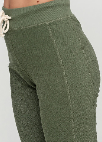 Оливковые спортивные демисезонные зауженные брюки H&M