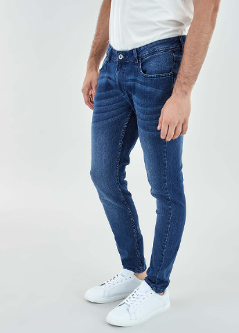 Синие демисезонные зауженные джинсы Piazza Italia