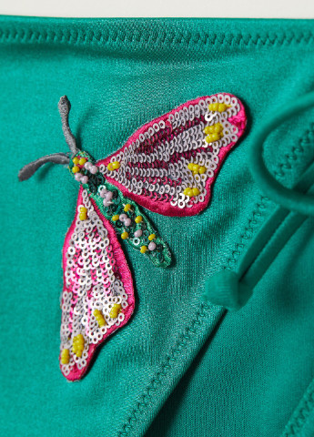 Зеленые блестящие плавки на завязках с рисунком H&M