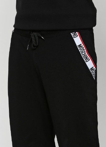 Черные спортивные демисезонные зауженные брюки Moschino