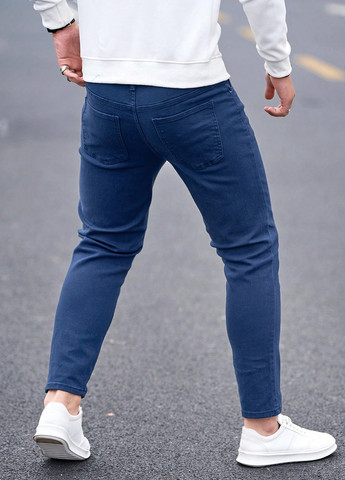 Синие демисезонные зауженные джинсы SHEIN