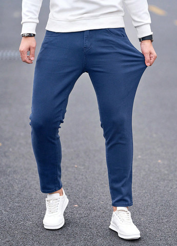 Синие демисезонные зауженные джинсы SHEIN