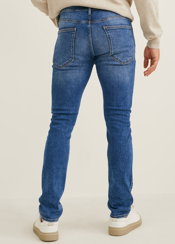 Синие демисезонные зауженные джинсы C&A