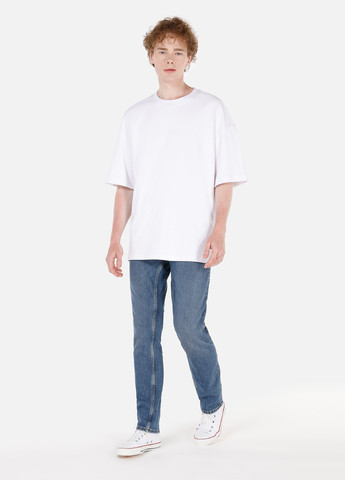 Синие демисезонные зауженные джинсы Colin's