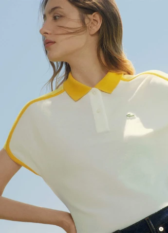 Белая женская футболка-поло Lacoste с логотипом