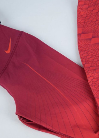 Красные демисезонные леггинсы Nike