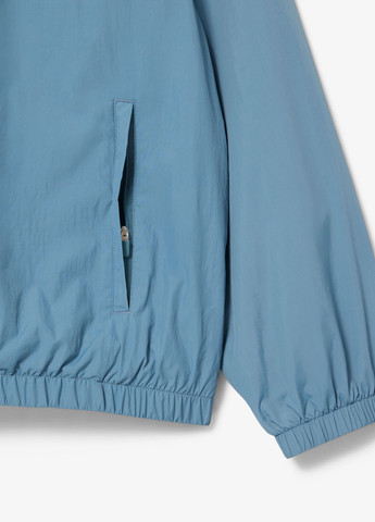 Блакитна демісезонна куртка Lacoste