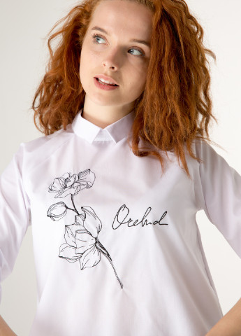 Біла демісезонна біла блуза з вишивкою: "орхідея" спереду INNOE Белая блуза