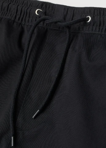 Черные демисезонные брюки H&M