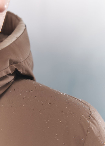 Бежева зимня куртка Springfield