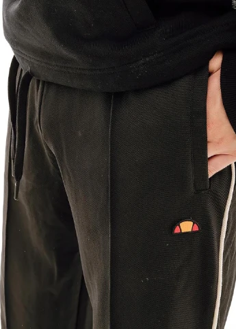 Черные спортивные демисезонные зауженные брюки Ellesse