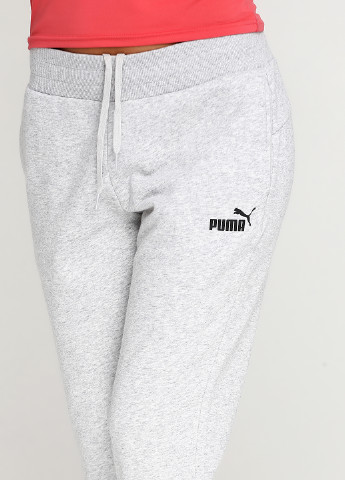 Светло-серые спортивные демисезонные зауженные брюки Puma