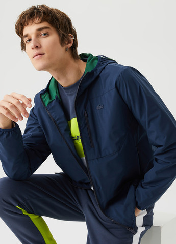 Темно-синяя демисезонная куртка Lacoste