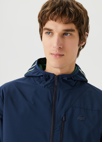Темно-синяя демисезонная куртка Lacoste