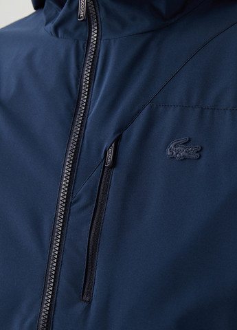 Темно-синяя демисезонная куртка Lacoste