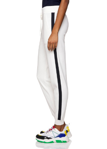 Белые спортивные демисезонные зауженные брюки United Colors of Benetton